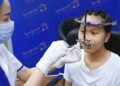 ‘Vương miện sắt’ giúp cô gái 19 tuổi khắc phục dị tật