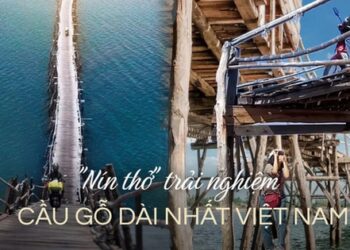 Cây cầu gỗ vượt sông dài nhất Việt Nam: Trải nghiệm thót tim đi mãi chẳng thấy bờ, nhưng đẹp và ngoạn mục hết sức!
